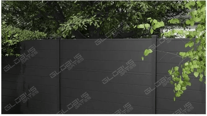 Black aluminum fence contrasted against greenery, highlighting durability and aesthetic appeal over PVC