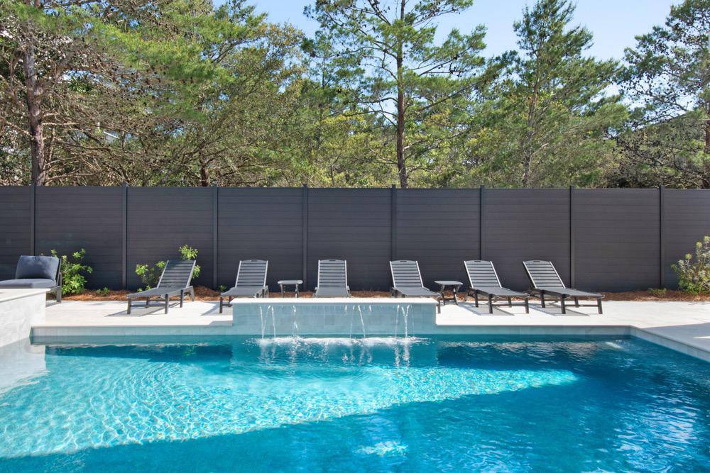 Local Yorba Linda pool fence contractor discussing project with homeowner