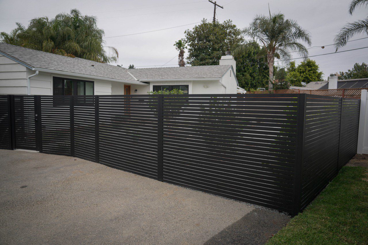 Durability and Maintenance of Powder-Coated Aluminum Fences in Coastal Suburban Climates