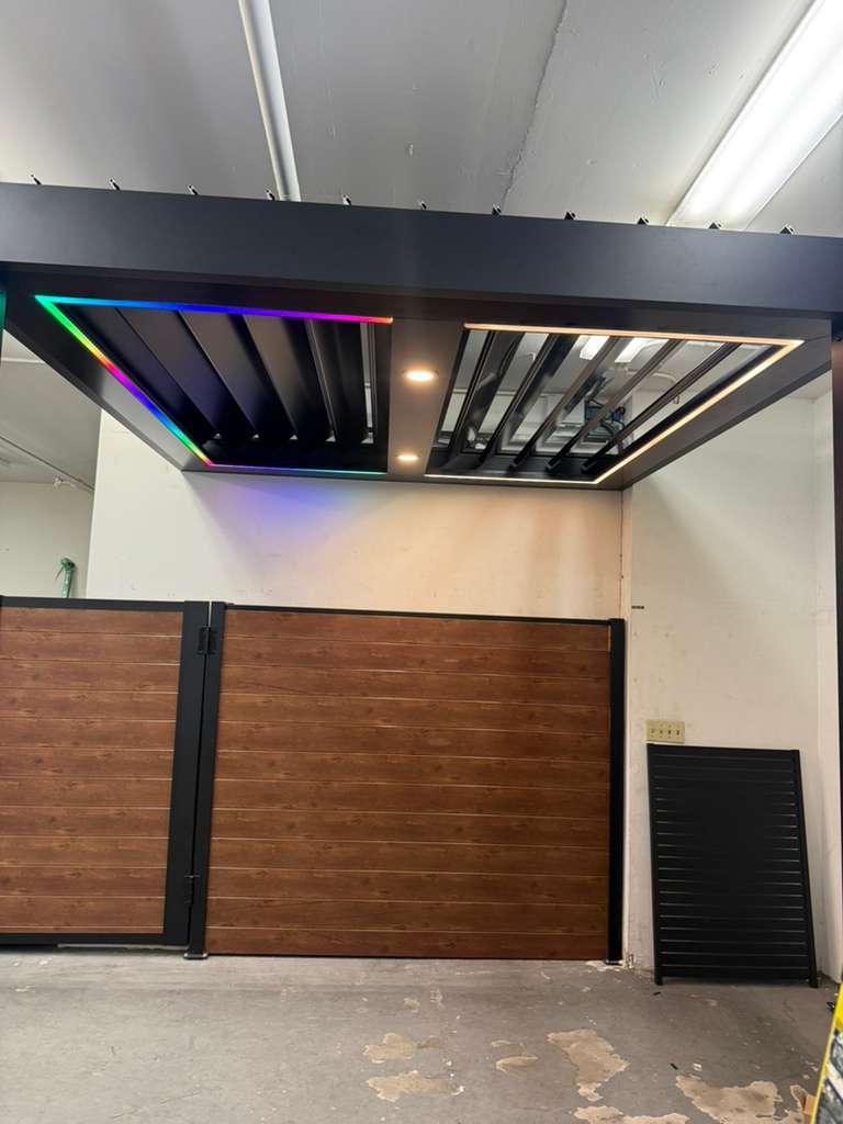 Louvered pergola installation