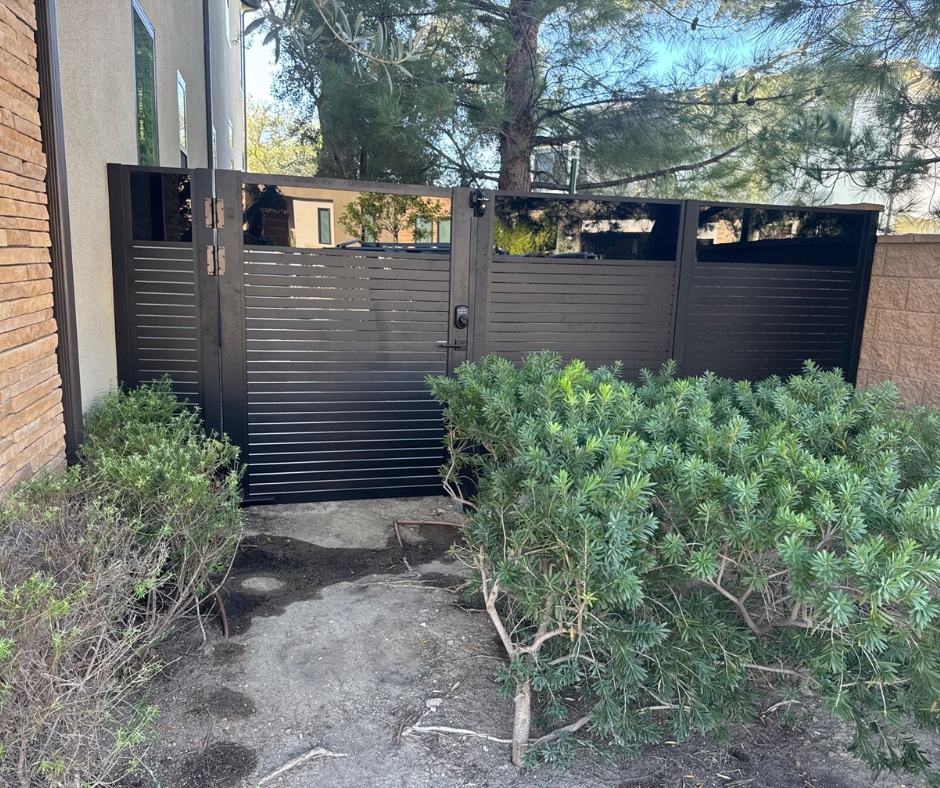 Aluminum plexiglass gate with transparent acrylic infill for modern residential entrance