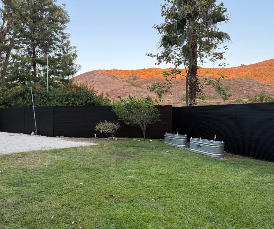 Aluminum T&G wall cladding installed on residential building facade with clean finish
