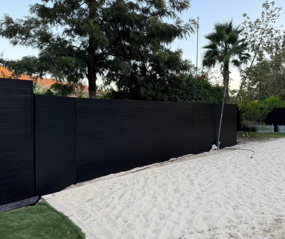 Close-up of aluminum T&G cladding panel surface showing precision tongue and groove texture