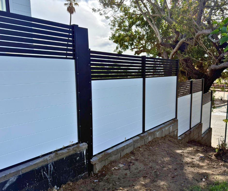 Aluminum Profile 50-60 T&G fence providing full privacy screening for residential property