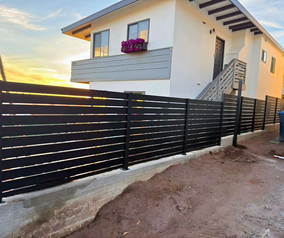 Profile 40 aluminum fence with wide slats offering partial privacy screening