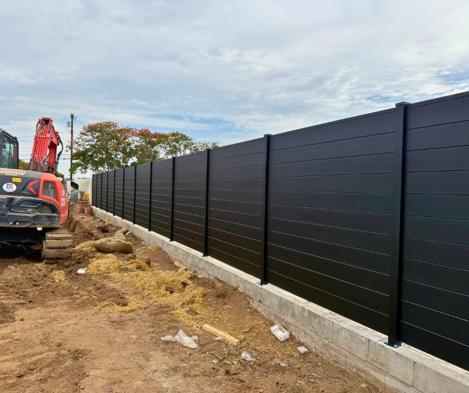 Aluminum Profile 50-60 T&G fence installed at villa perimeter with decorative posts