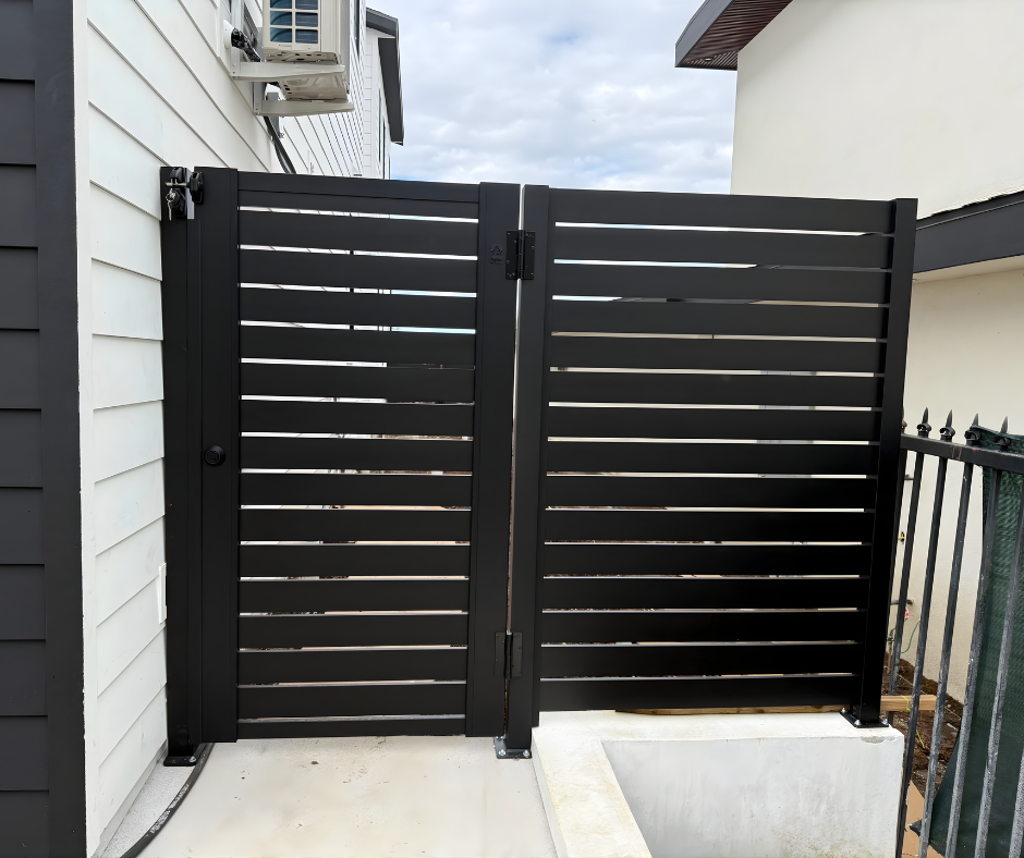 Profile 40 aluminum driveway gate with matching fence panels for full boundary system