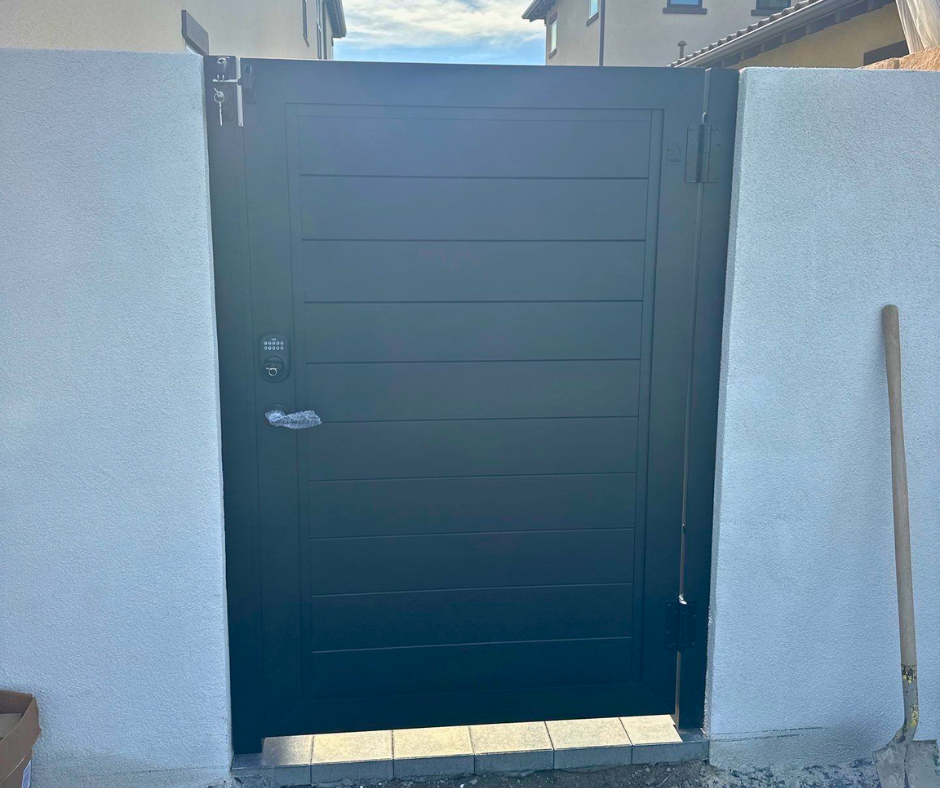 Profile 50-60 T&G aluminum driveway gate with matching privacy fence panel system