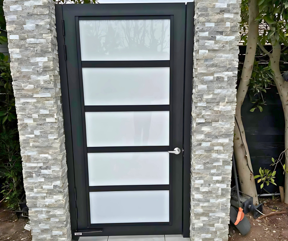 Precision corner finish on aluminum plexiglass gate with clean welded joints