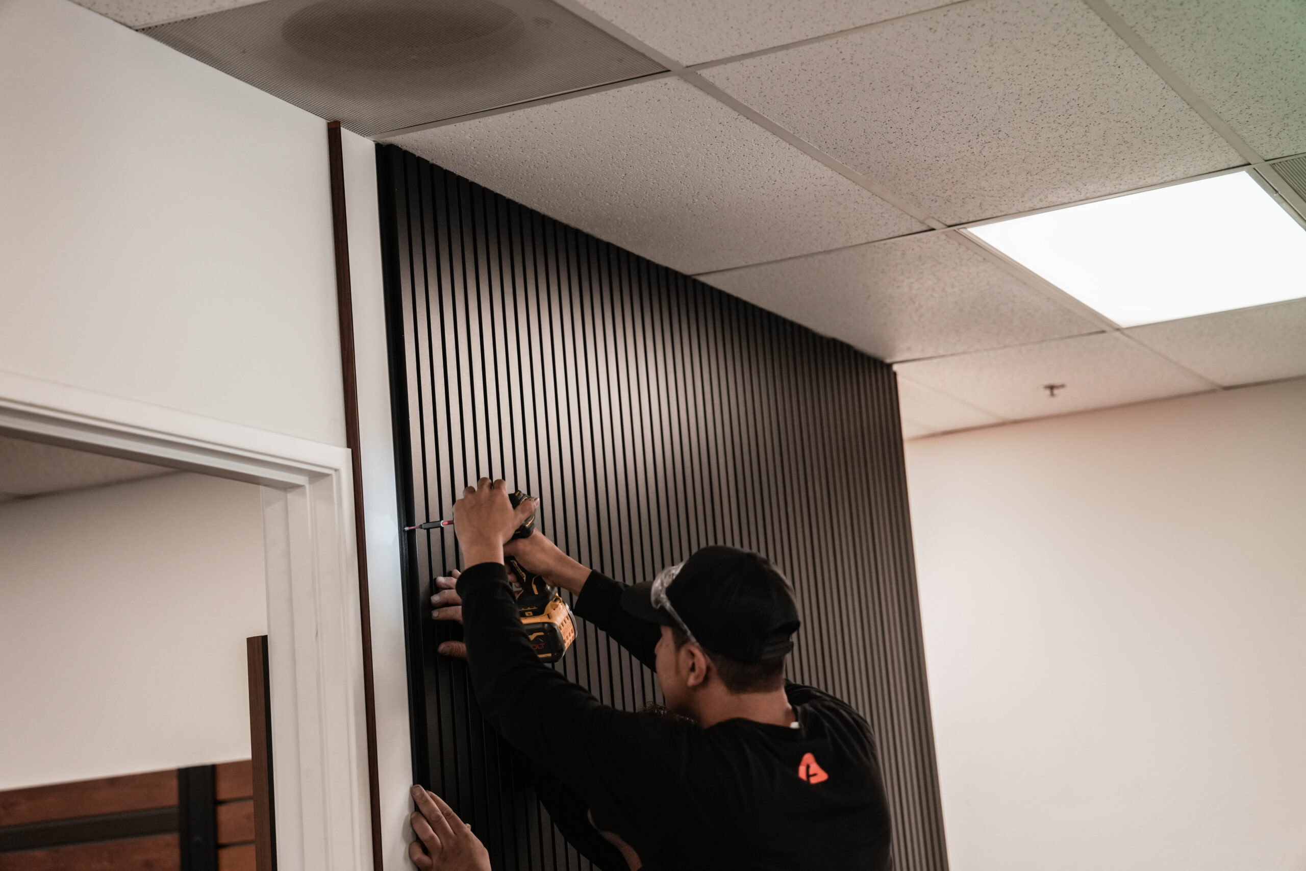 Real installation of aluminum T&G wall cladding on modern residential building exterior