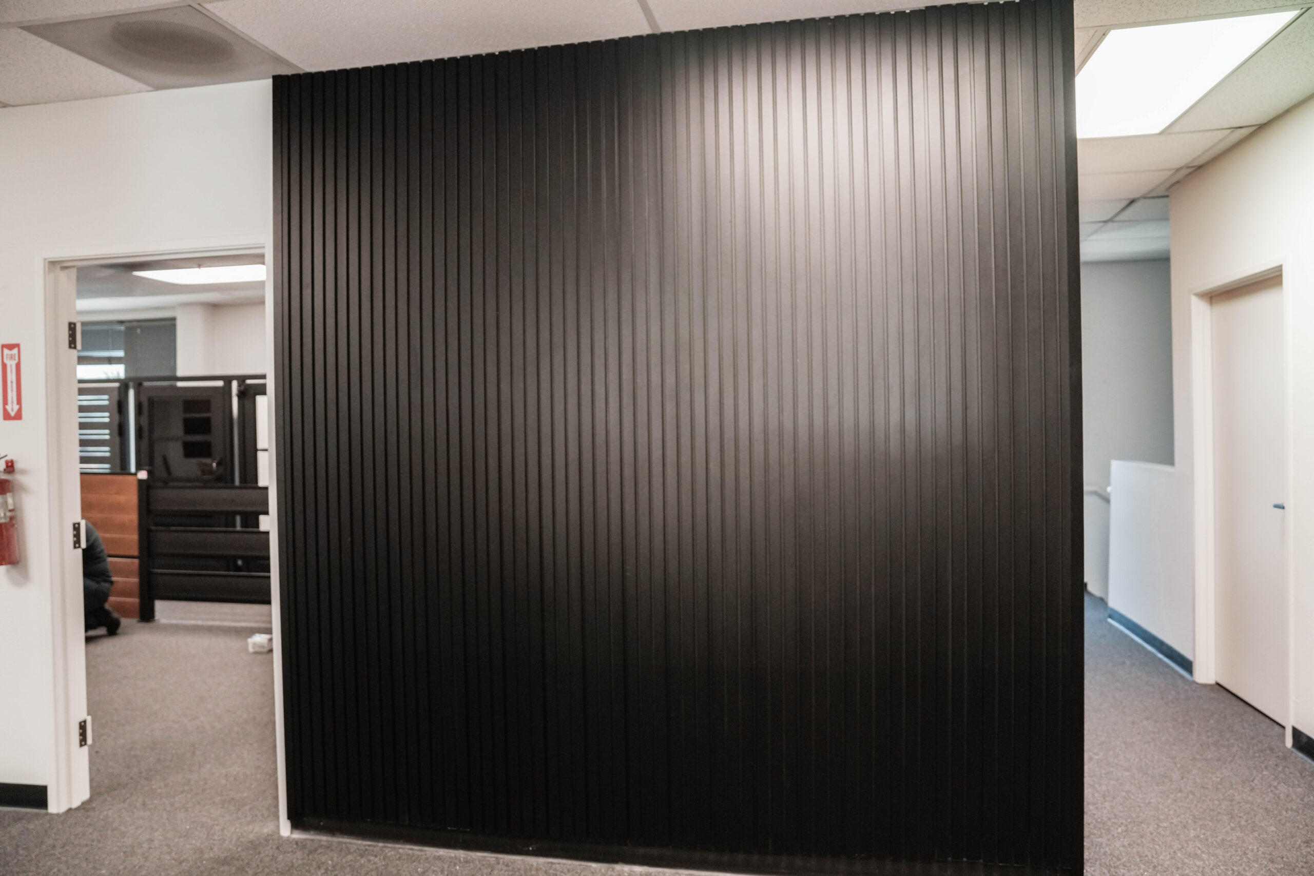 Aluminum T&G wall cladding installed on commercial building with powder-coated finish