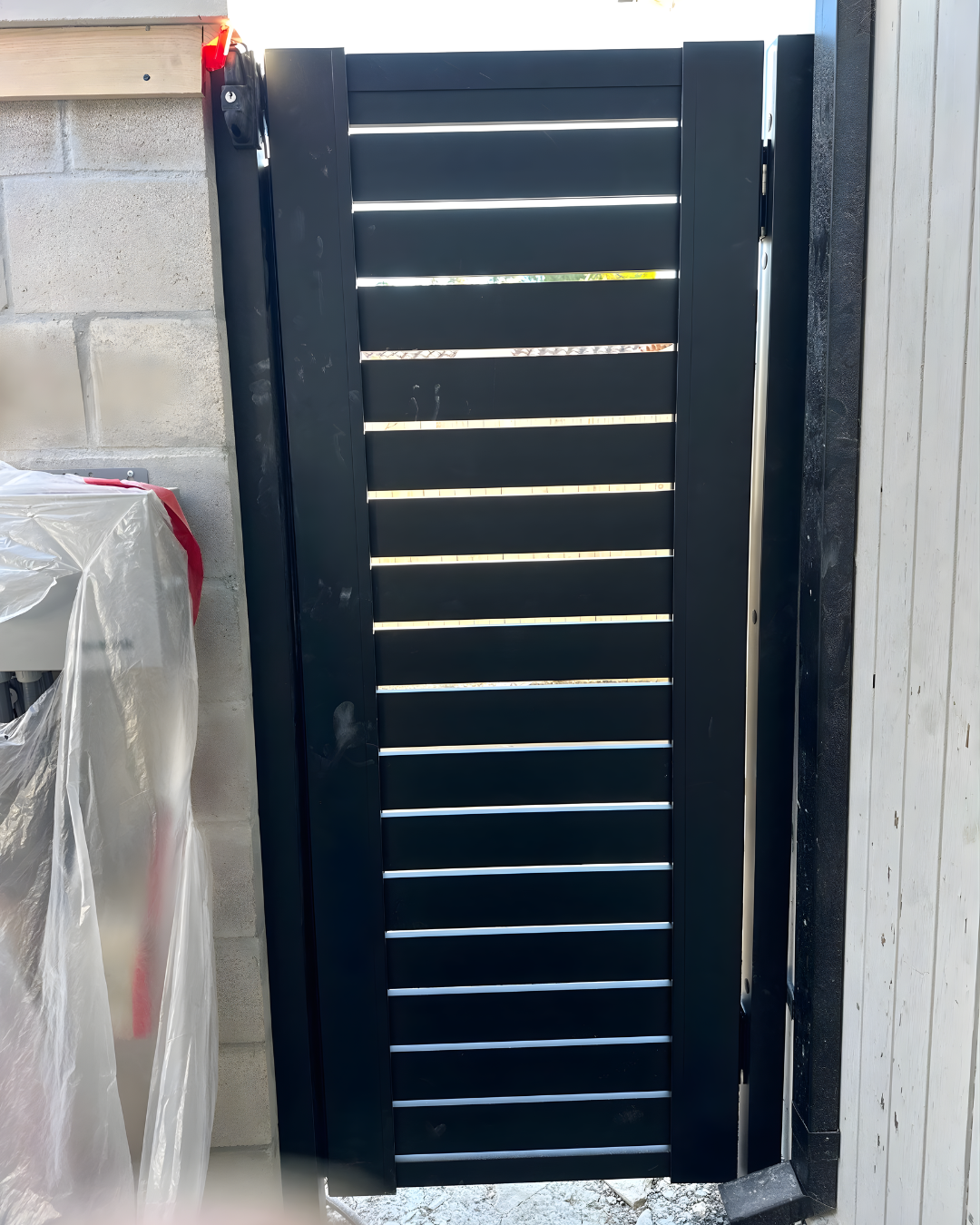 DIY aluminum pedestrian gate with narrow profile for garden side entrance