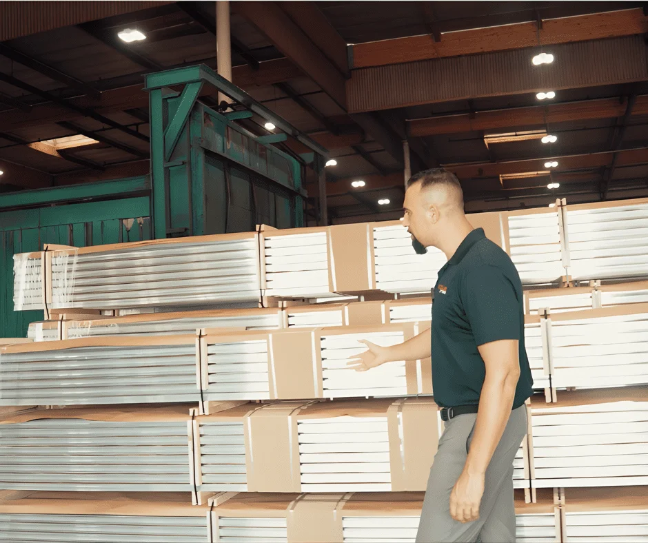 Globus Gates factory floor with finished aluminum panels and inventory