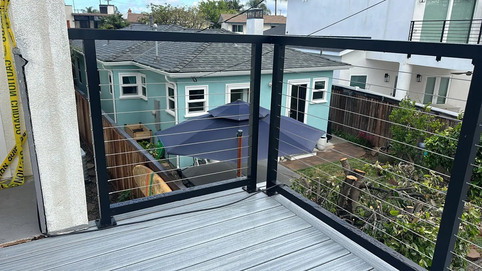 Cable railing around outdoor deck corner
